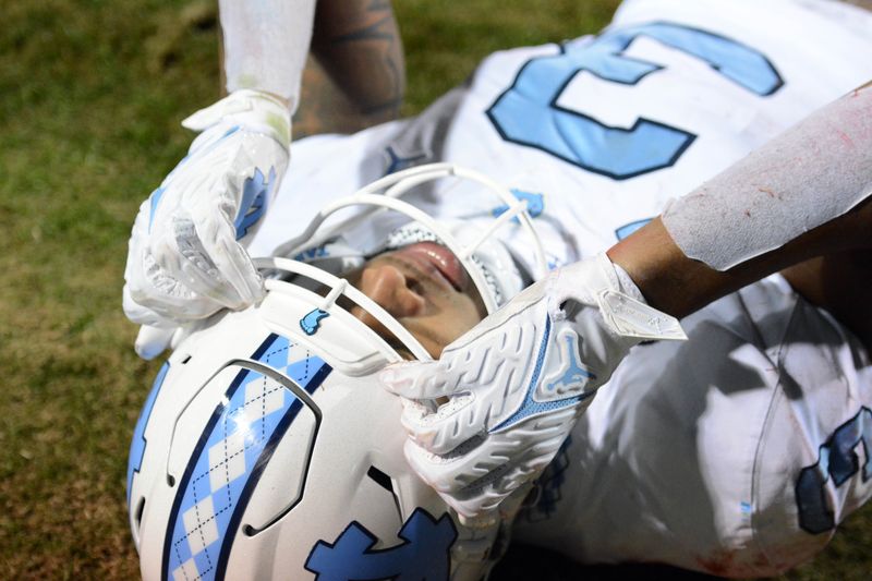 Nov 26, 2021; Raleigh, North Carolina, USA;  North Carolina Tar Heels wide receiver Antoine Green (3) reacts after dropping a touchdown pass during the second half against the North Carolina State Wolfpack at Carter-Finley Stadium.  The Wolfpack won 34-30. Mandatory Credit: Rob Kinnan-USA TODAY Sports