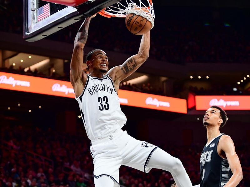 AUSTIN, TX - MARCH 17: Nicolas Claxton #33 of the Brooklyn Nets dunks the ball during the game against the San Antonio Spurs on March 17, 2024 at the Moody Center in Austin, Texas. NOTE TO USER: User expressly acknowledges and agrees that, by downloading and or using this photograph, user is consenting to the terms and conditions of the Getty Images License Agreement. Mandatory Copyright Notice: Copyright 2024 NBAE (Photos by Michael Gonzales/NBAE via Getty Images)