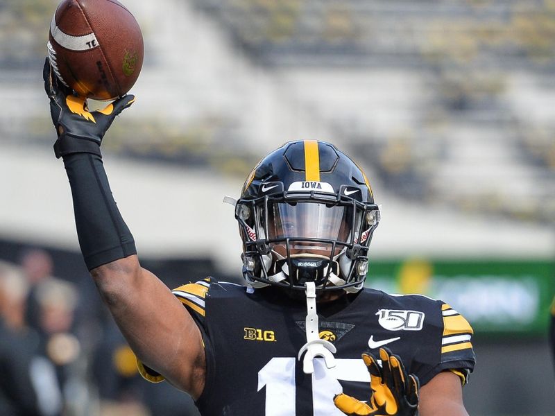 Nov 23, 2019; Iowa City, IA, USA; Iowa Hawkeyes running back Tyler Goodson (15) warms up before the game against the Illinois Fighting Illini at Kinnick Stadium. Mandatory Credit: Jeffrey Becker-USA TODAY Sports