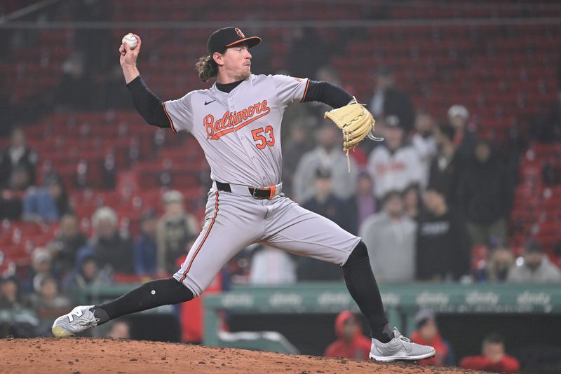 Apr 11, 20024; Boston, Massachusetts, USA; Baltimore Orioles pitcher Mike Baumann (53) pitches against the Boston Red Sox during the tenth inning at Fenway Park. Mandatory Credit: Eric Canha-USA TODAY Sports