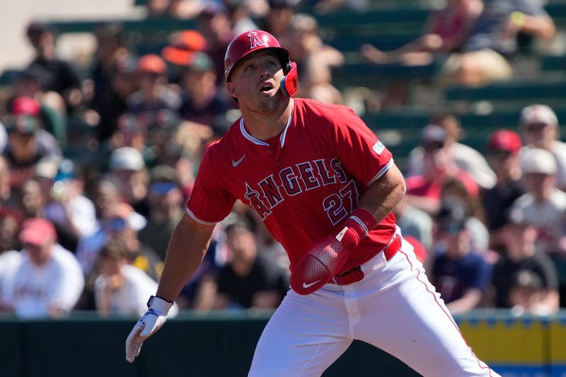 Mar 22, 2024; Tempe, Arizona, USA; Los Angeles Angels center fielder Mike Trout (27) leads off the base against the Chicago White Sox in the first inning at Tempe Diablo Stadium. Mandatory Credit: Rick Scuteri-USA TODAY Sports