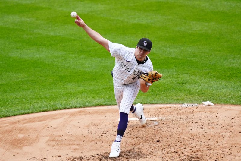 May 9, 2024; Denver, Colorado, USA; Colorado Rockies pitcher Cal Quantrill (47) delivers a pitch in the third inning against the San Francisco Giants at Coors Field. Mandatory Credit: Ron Chenoy-USA TODAY Sports