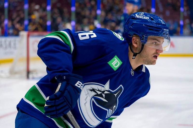 Nov 12, 2024; Vancouver, British Columbia, CAN; Vancouver Canucks defenseman Erik Brannstrom (26) warms up prior to a game against the Calgary Flames at Rogers Arena. Mandatory Credit: Bob Frid-Imagn Images