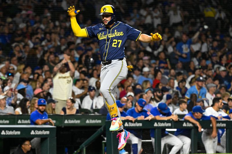 Jul 22, 2024; Chicago, Illinois, USA;  Milwaukee Brewers shortstop Willy Adames (27) hops after hitting a home run against the Chicago Cubs during the eighth inning at Wrigley Field. Mandatory Credit: Matt Marton-USA TODAY Sports