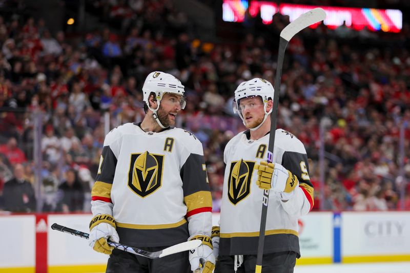 Dec 23, 2023; Sunrise, Florida, USA; Vegas Golden Knights defenseman Alex Pietrangelo (7) and Vegas Golden Knights center Jack Eichel (9) talk against the Florida Panthers during the second period at Amerant Bank Arena. Mandatory Credit: Sam Navarro-USA TODAY Sports