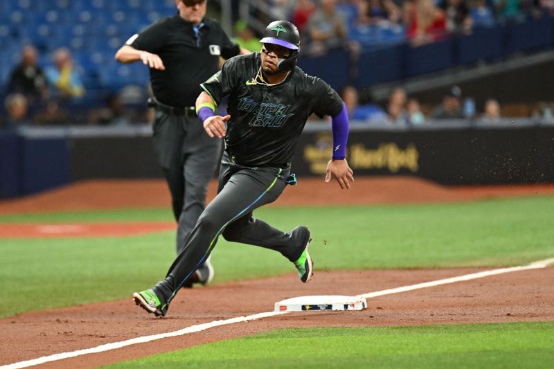 May 7, 2024; St. Petersburg, Florida, USA;  Tampa Bay Rays third baseman Isaac Paredes (17) rounds third base on the way to scoring a run in the second inning against the Chicago White Sox at Tropicana Field. Mandatory Credit: Jonathan Dyer-USA TODAY Sports