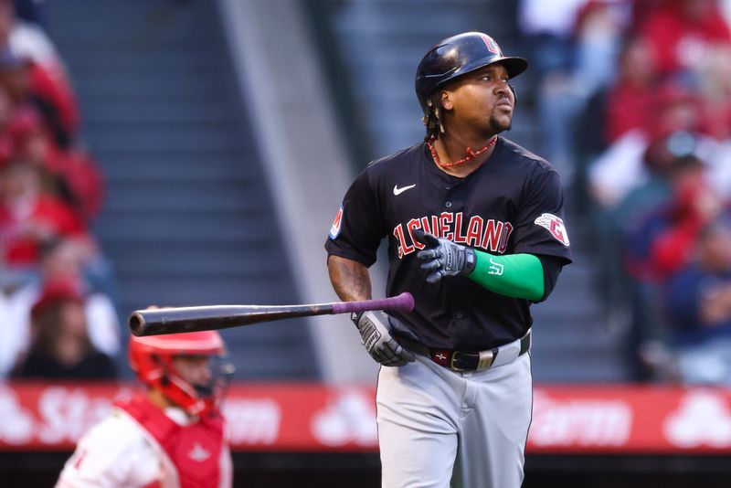 May 24, 2024; Anaheim, California, USA; Cleveland Guardians third base José Ramírez (11) drops the bat after hitting a home run against the Los Angeles Angels during the third inning of a game at Angel Stadium. Mandatory Credit: Jessica Alcheh-USA TODAY Sports