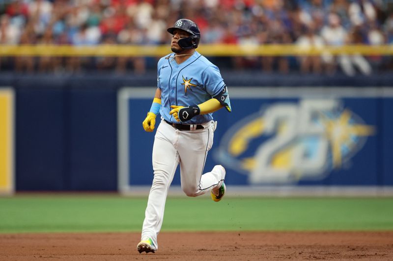 Jul 9, 2023; St. Petersburg, Florida, USA;  Tampa Bay Rays third baseman Isaac Paredes (17) rounds the bases after hitting a two-run home run against the Atlanta Braves in the first inning at Tropicana Field. Mandatory Credit: Nathan Ray Seebeck-USA TODAY Sports