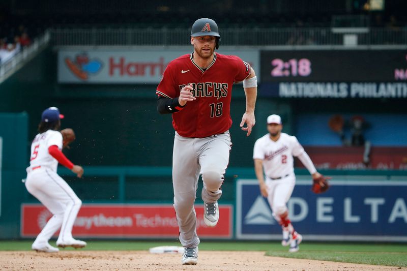 Jun 22, 2023; Washington, District of Columbia, USA; Arizona Diamondbacks catcher Carson Kelly (18) runs to third base in the fifth inning against the Washington Nationals at Nationals Park. Mandatory Credit: Amber Searls-USA TODAY Sports