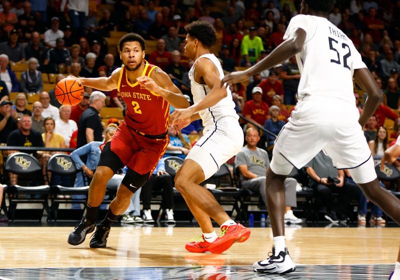 Feb 11, 2025; Orlando, Florida, USA; Iowa State Cyclones center Joshua Jefferson (2) drives to the basket against the Central Florida Knights at Addition Financial Arena. Mandatory Credit: Russell Lansford-Imagn Images