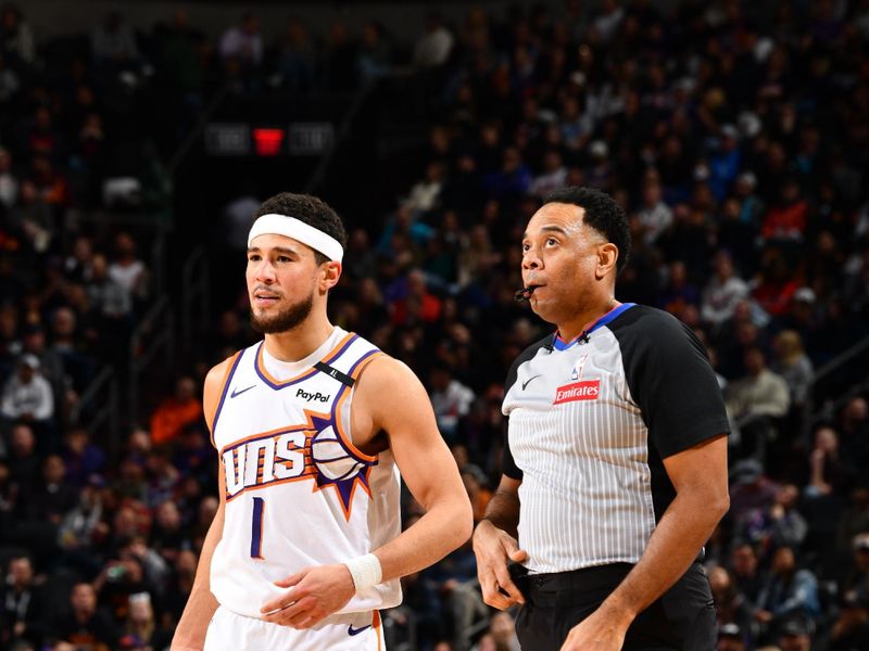 PHOENIX, AZ - JANUARY 27: Devin Booker #1 of the Phoenix Suns looks on during the game against the LA Clippers on January 27, 2025 at Footprint Center in Phoenix, Arizona. NOTE TO USER: User expressly acknowledges and agrees that, by downloading and or using this photograph, user is consenting to the terms and conditions of the Getty Images License Agreement. Mandatory Copyright Notice: Copyright 2025 NBAE (Photo by Barry Gossage/NBAE via Getty Images)