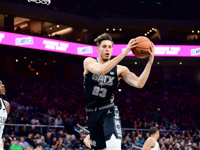 AUSTIN, TX - MARCH 17: Zach Collins #23 of the San Antonio Spurs grabs the rebound during the game against the Brooklyn Nets on March 17, 2024 at the Moody Center in Austin, Texas. NOTE TO USER: User expressly acknowledges and agrees that, by downloading and or using this photograph, user is consenting to the terms and conditions of the Getty Images License Agreement. Mandatory Copyright Notice: Copyright 2024 NBAE (Photos by Michael Gonzales/NBAE via Getty Images)