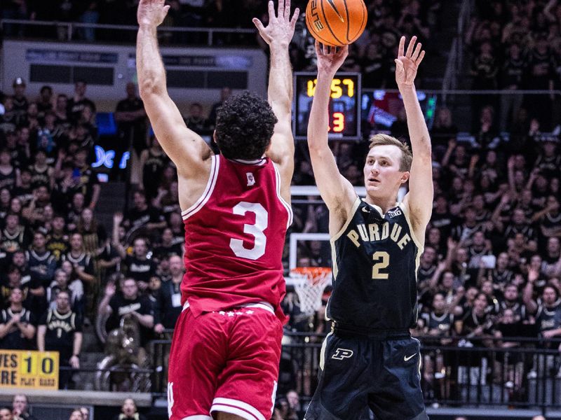 Feb 10, 2024; West Lafayette, Indiana, USA; Purdue Boilermakers guard Fletcher Loyer (2) shoots the ball while  Indiana Hoosiers guard Anthony Leal (3) defends in the second half at Mackey Arena. Mandatory Credit: Trevor Ruszkowski-USA TODAY Sports