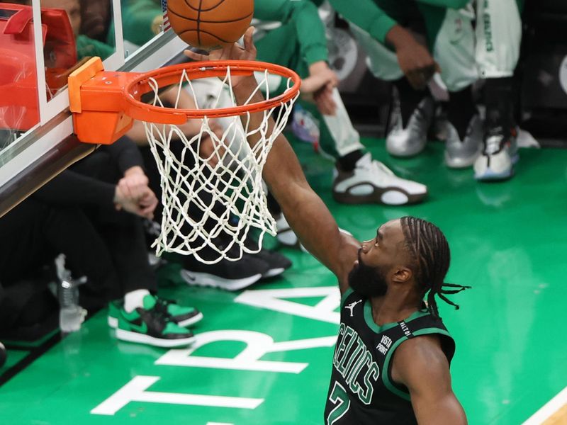 BOSTON, MA - JUNE 9: Jaylen Brown #7 of the Boston Celtics drives to the basket during the game against the Dallas Mavericks during Game 2 of the 2024 NBA Finals on June 9, 2024 at the TD Garden in Boston, Massachusetts. NOTE TO USER: User expressly acknowledges and agrees that, by downloading and or using this photograph, User is consenting to the terms and conditions of the Getty Images License Agreement. Mandatory Copyright Notice: Copyright 2024 NBAE  (Photo by Joe Murphy/NBAE via Getty Images)