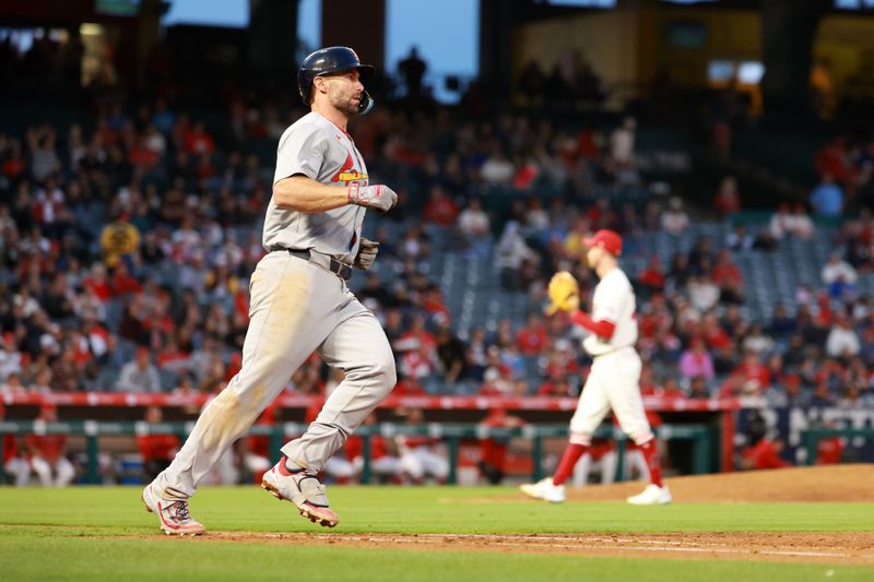 May 15, 2024; Anaheim, California, USA;  St. Louis Cardinals first baseman Paul Goldschmidt (46) hits a home run during the sixth inning against the Los Angeles Angels at Angel Stadium. Mandatory Credit: Kiyoshi Mio-USA TODAY Sports