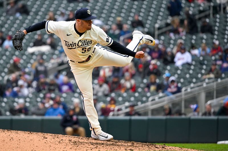 Apr 23, 2023; Minneapolis, Minnesota, USA;  Minnesota Twins pitcher Caleb Thielbar (56) delivers against the Minnesota Twins at Target Field. Mandatory Credit: Nick Wosika-USA TODAY Sports