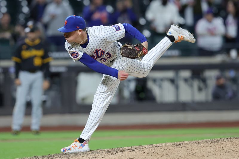 Apr 16, 2024; New York City, New York, USA; New York Mets pitcher Drew Smith (33) follows through on a pitch against the Pittsburgh Pirates during the ninth inning at Citi Field. Mandatory Credit: Brad Penner-USA TODAY Sports