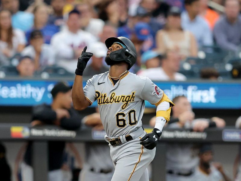 Aug 15, 2023; New York City, New York, USA; Pittsburgh Pirates shortstop Liover Peguero (60) reacts as he rounds the bases after hitting a solo home run against the New York Mets during the second inning at Citi Field. Mandatory Credit: Brad Penner-USA TODAY Sports