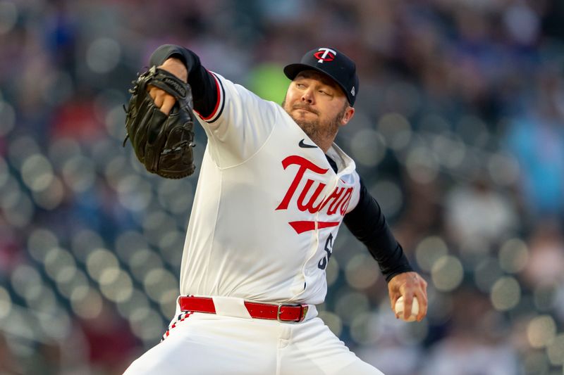 May 8, 2024; Minneapolis, Minnesota, USA; Minnesota Twins pitcher Caleb Thielbar (56) delivers a pitch against the Seattle Mariners in the sixth inning at Target Field. Mandatory Credit: Jesse Johnson-USA TODAY Sports