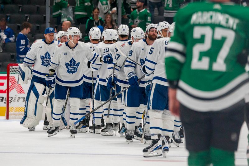 Oct 26, 2023; Dallas, Texas, USA; The Toronto Maple Leafs celebrate on the ice after their victory over the Dallas Stars at the American Airlines Center. Mandatory Credit: Jerome Miron-USA TODAY Sports