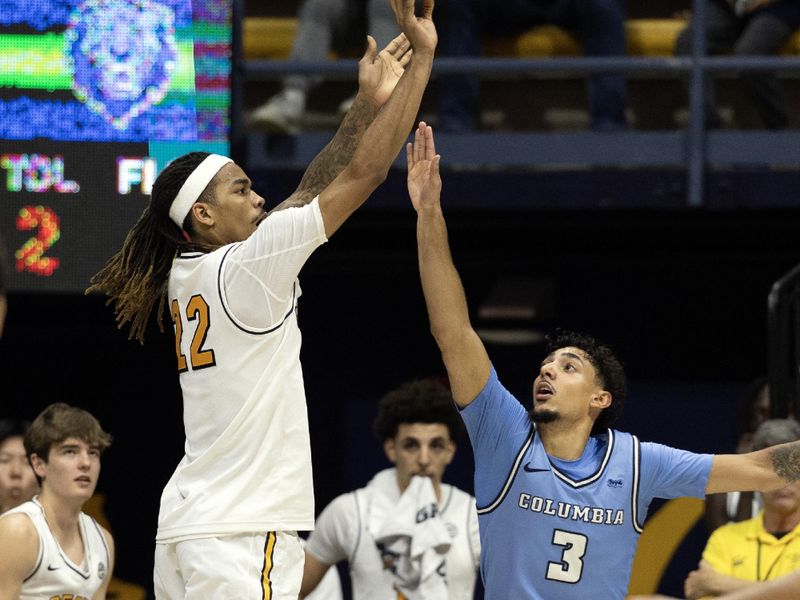 Dec 21, 2025; Berkeley, California, USA; California Golden Bears forward Chris Bell (22) shoots over Columbia Lions forward Blair Thompson (3) during the second half at Haas Pavilion. Mandatory Credit: D. Ross Cameron-Imagn Images