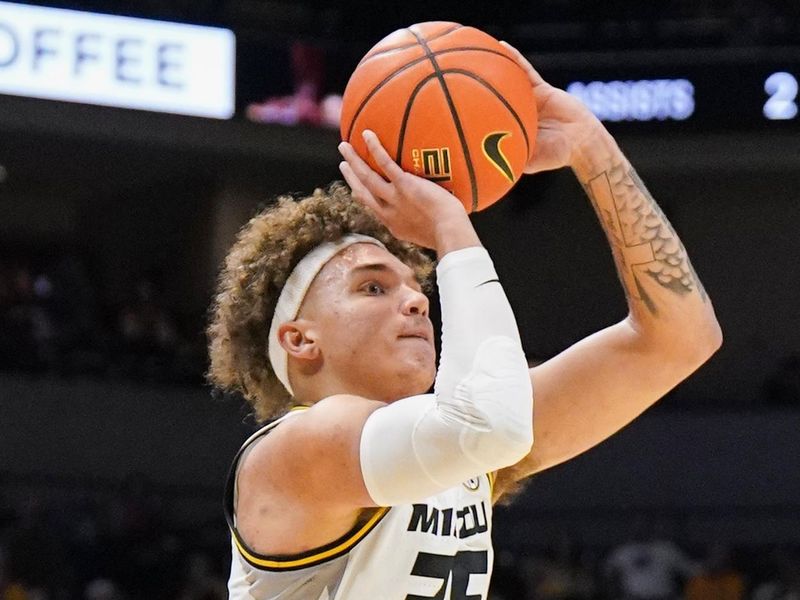 Jan 6, 2024; Columbia, Missouri, USA; Missouri Tigers forward Noah Carter (35) shoots a three point basket against the Georgia Bulldogs during the first half at Mizzou Arena. Mandatory Credit: Denny Medley-USA TODAY Sports