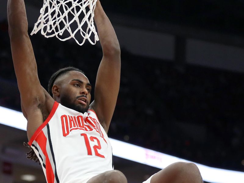 Jan 20, 2024; Columbus, Ohio, USA;  Ohio State Buckeyes guard Evan Mahaffey (12) dunks the ball during the second half against the Penn State Nittany Lions at Value City Arena. Mandatory Credit: Joseph Maiorana-USA TODAY Sports