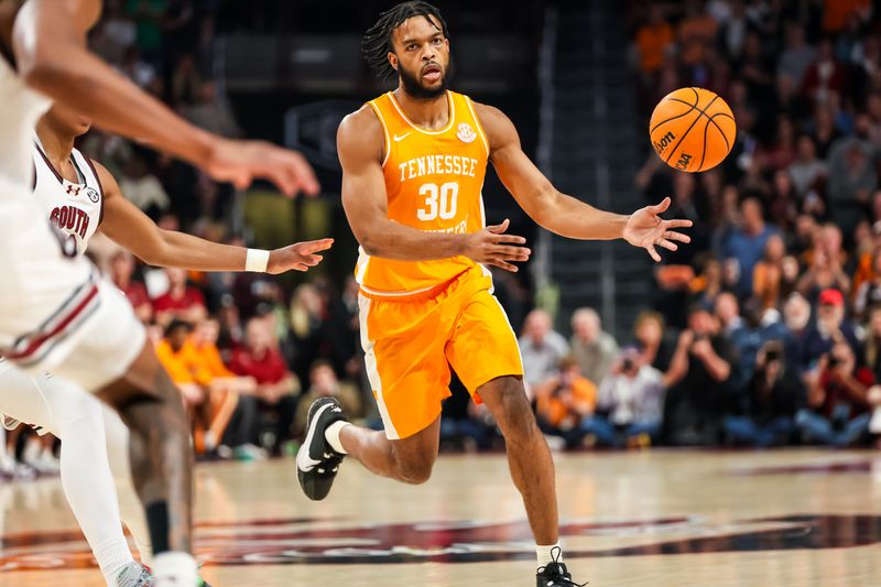 Mar 6, 2024; Columbia, South Carolina, USA; Tennessee Volunteers guard Josiah-Jordan James (30) passes against the South Carolina Gamecocks in the first half at Colonial Life Arena. Mandatory Credit: Jeff Blake-USA TODAY Sports