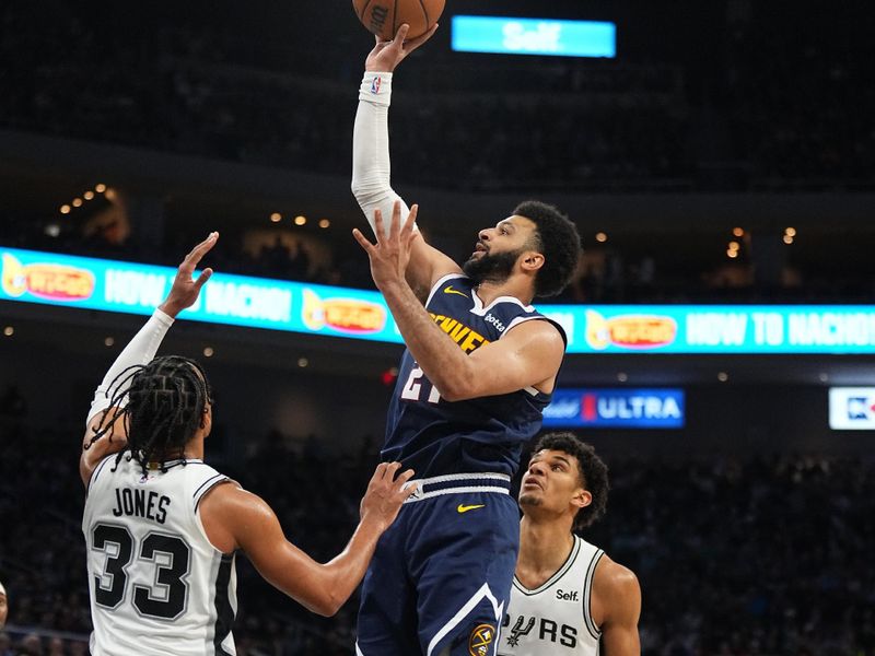 AUSTIN, TX - MARCH 15: Jamal Murray #27 of the Denver Nuggets drives to the basket during the game against the San Antonio Spurs on March 15, 2024 at the Moody Center in Austin, Texas. NOTE TO USER: User expressly acknowledges and agrees that, by downloading and/or using this Photograph, user is consenting to the terms and conditions of the Getty Images License Agreement. Mandatory Copyright Notice: Copyright 2024 NBAE (Photo by Garrett Ellwood/NBAE via Getty Images)