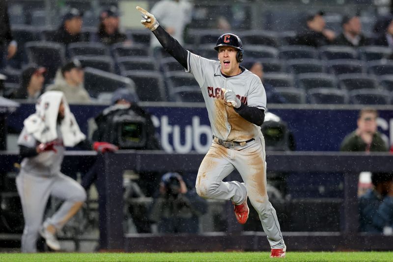 May 3, 2023; Bronx, New York, USA; Cleveland Guardians center fielder Myles Straw (7) reacts to scoring a run on a single by pinch hitter Oscar Gonzalez (not pictured) against the New York Yankees during the ninth inning at Yankee Stadium. Mandatory Credit: Brad Penner-USA TODAY Sports