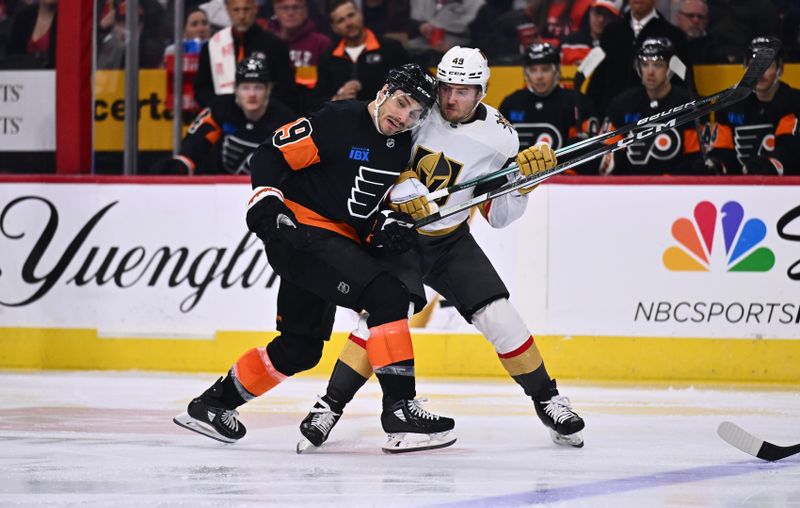 Nov 18, 2023; Philadelphia, Pennsylvania, USA; Philadelphia Flyers right wing Garnet Hathaway (19) and Vegas Golden Knights center Ivan Barbashev (49) collide in the third period at Wells Fargo Center. Mandatory Credit: Kyle Ross-USA TODAY Sports