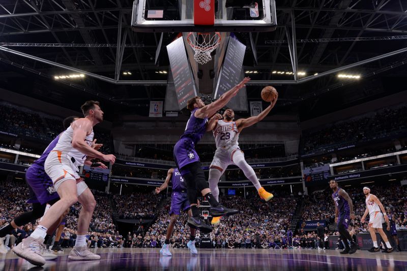 SACRAMENTO, CA - APRIL 12: Eric Gordon #23 of the Phoenix Suns drives to the basket during the game against the Sacramento Kings on April 12, 2024 at Golden 1 Center in Sacramento, California. NOTE TO USER: User expressly acknowledges and agrees that, by downloading and or using this Photograph, user is consenting to the terms and conditions of the Getty Images License Agreement. Mandatory Copyright Notice: Copyright 2024 NBAE (Photo by Rocky Widner/NBAE via Getty Images)