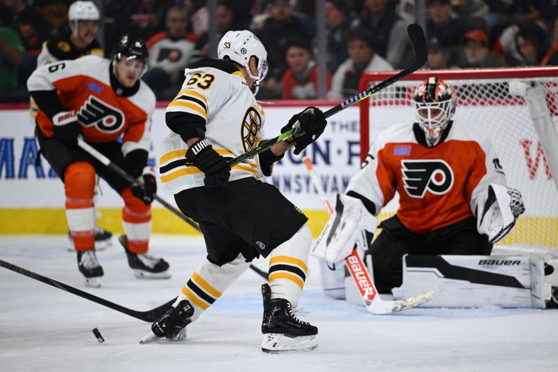 Nov 2, 2024; Philadelphia, Pennsylvania, USA; Boston Bruins left wing Brad Marchand (63) loses control of the puck against the Philadelphia Flyers in the first period at Wells Fargo Center. Mandatory Credit: Kyle Ross-Imagn Images