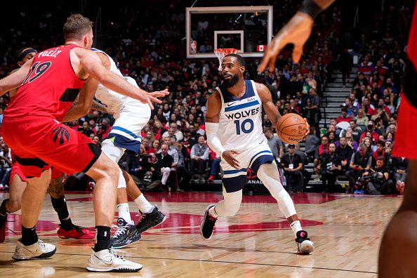 TORONTO, CANADA - OCTOBER 25: Mike Conley #10 of the Minnesota Timberwolves dribbles the ball during the game against the Toronto Raptors on October 25, 2023 at the Scotiabank Arena in Toronto, Ontario, Canada.  NOTE TO USER: User expressly acknowledges and agrees that, by downloading and or using this Photograph, user is consenting to the terms and conditions of the Getty Images License Agreement.  Mandatory Copyright Notice: Copyright 2023 NBAE (Photo by Mark Blinch/NBAE via Getty Images)