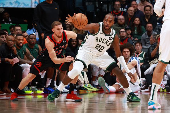 TORONTO, CANADA - NOVEMBER 15:  Khris Middleton #22 of the Milwaukee Bucks handles the ball during the game against the Toronto Raptors on November 15, 2023 at the Scotiabank Arena in Toronto, Ontario, Canada.  NOTE TO USER: User expressly acknowledges and agrees that, by downloading and or using this Photograph, user is consenting to the terms and conditions of the Getty Images License Agreement.  Mandatory Copyright Notice: Copyright 2023 NBAE (Photo by Vaughn Ridley/NBAE via Getty Images)