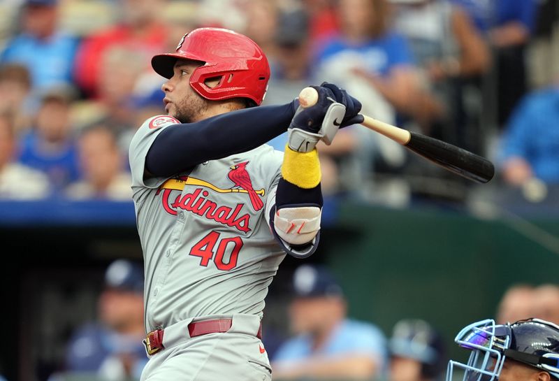 Aug 9, 2024; Kansas City, Missouri, USA; St. Louis Cardinals catcher Willson Contreras (40) hits a home run during the first inning against the Kansas City Royals at Kauffman Stadium. Mandatory Credit: Jay Biggerstaff-USA TODAY Sports