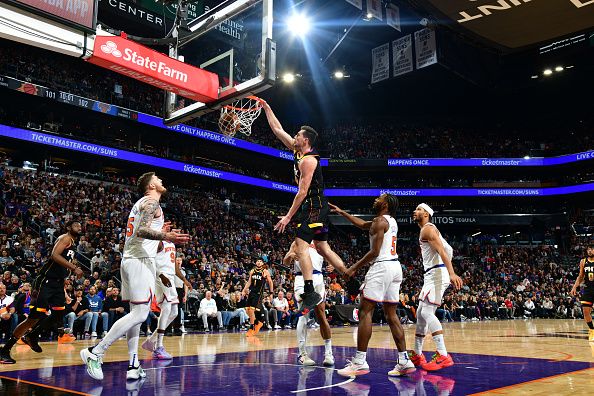 PHOENIX, AZ - DECEMBER 15: Drew Eubanks #14 of the Phoenix Suns dunks the ball during the game against the New York Knicks on December 15, 2023 at Footprint Center in Phoenix, Arizona. NOTE TO USER: User expressly acknowledges and agrees that, by downloading and or using this photograph, user is consenting to the terms and conditions of the Getty Images License Agreement. Mandatory Copyright Notice: Copyright 2023 NBAE (Photo by Kate Frese/NBAE via Getty Images)