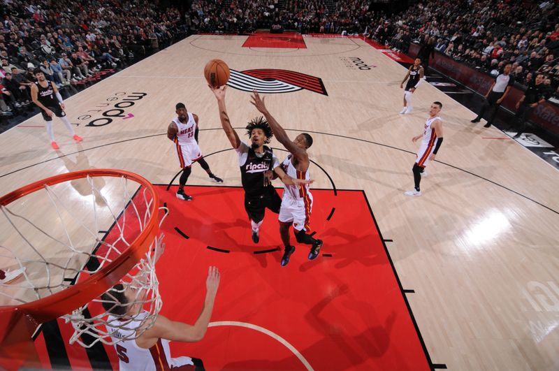 PORTLAND, OR - JANUARY 11:  Shaedon Sharpe #17 of the Portland Trail Blazers shoots the ball during the game against the Miami Heat on January 11, 2025 at the Moda Center Arena in Portland, Oregon. NOTE TO USER: User expressly acknowledges and agrees that, by downloading and or using this photograph, user is consenting to the terms and conditions of the Getty Images License Agreement. Mandatory Copyright Notice: Copyright 2025 NBAE (Photo by Cameron Browne/NBAE via Getty Images)