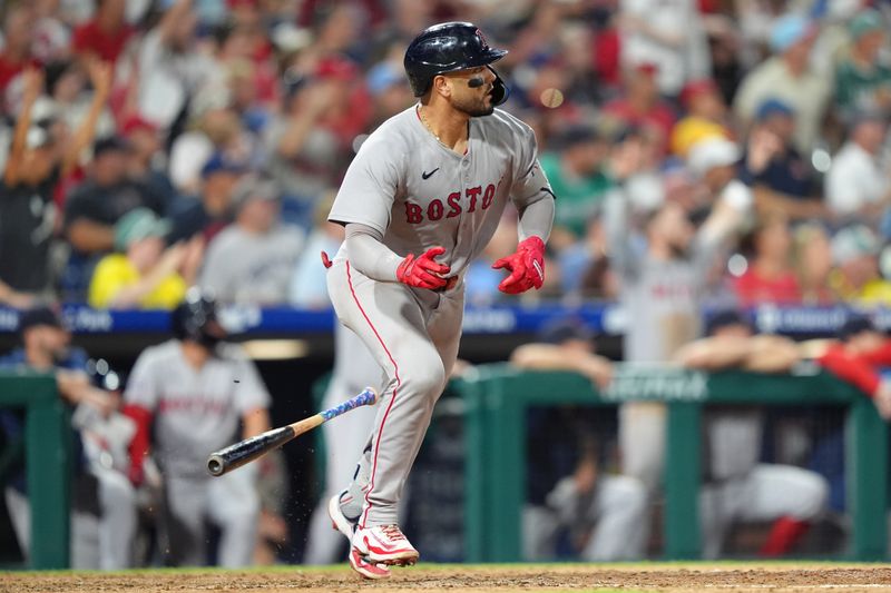 Jul 23, 2025; Philadelphia, Pennsylvania, USA; Boston Red Sox catcher Carlos Narvaez (75) watches the ball after hitting a two-run home run against the Philadelphia Phillies in the eleventh inning at Citizens Bank Park. Mandatory Credit: Kyle Ross-Imagn Images