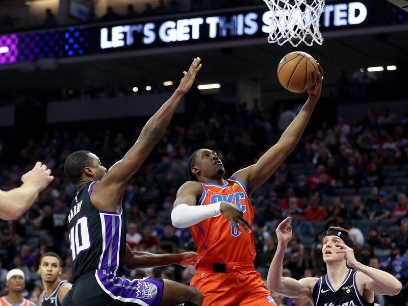 SACRAMENTO, CALIFORNIA - DECEMBER 14: Jalen Williams #8 of the Oklahoma City Thunder goes up for a shot on Harrison Barnes #40 of the Sacramento Kings in the first half at Golden 1 Center on December 14, 2023 in Sacramento, California. NOTE TO USER: User expressly acknowledges and agrees that, by downloading and or using this photograph, User is consenting to the terms and conditions of the Getty Images License Agreement.  (Photo by Ezra Shaw/Getty Images)