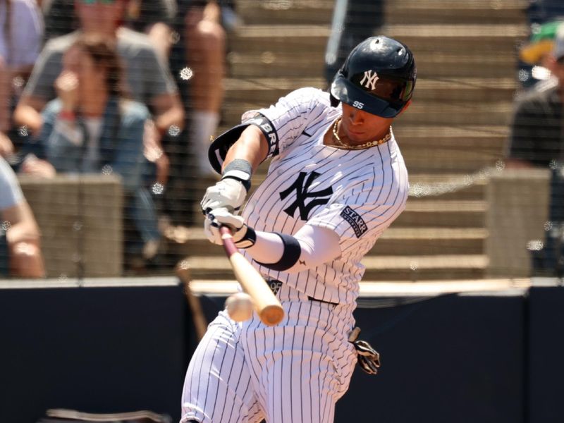 Mar 10, 2024; Tampa, Florida, USA; New York Yankees infielder Oswaldo Cabrera (95) singles during the second inning against the Atlanta Braves at George M. Steinbrenner Field. Mandatory Credit: Kim Klement Neitzel-USA TODAY Sports