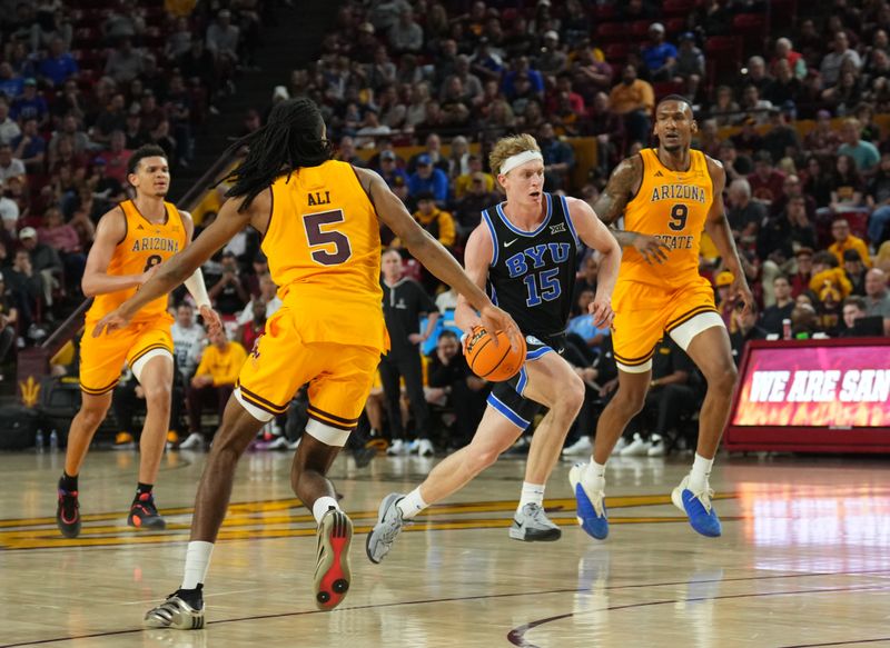 Feb 26, 2025; Tempe, Arizona, USA; Brigham Young Cougars forward Richie Saunders (15) drives against the Arizona State Sun Devils during the second half at Desert Financial Arena. Mandatory Credit: Joe Camporeale-Imagn Images