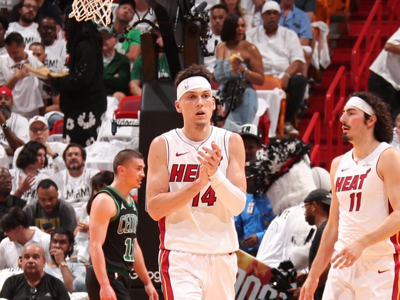 MIAMI, FL - APRIL 27: Tyler Herro #14 of the Miami Heat celebrates during the game against the Boston Celtics during Round 1 Game 3 of the 2024 NBA Playoffs on April 27, 2024 at Kaseya Center in Miami, Florida. NOTE TO USER: User expressly acknowledges and agrees that, by downloading and or using this Photograph, user is consenting to the terms and conditions of the Getty Images License Agreement. Mandatory Copyright Notice: Copyright 2024 NBAE (Photo by Issac Baldizon/NBAE via Getty Images)