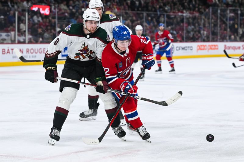 Feb 27, 2024; Montreal, Quebec, CAN; Arizona Coyotes defenseman J.J. Moser (90) defends against Montreal Canadiens right wing Cole Caufield (22) during the second period at Bell Centre. Mandatory Credit: David Kirouac-USA TODAY Sports