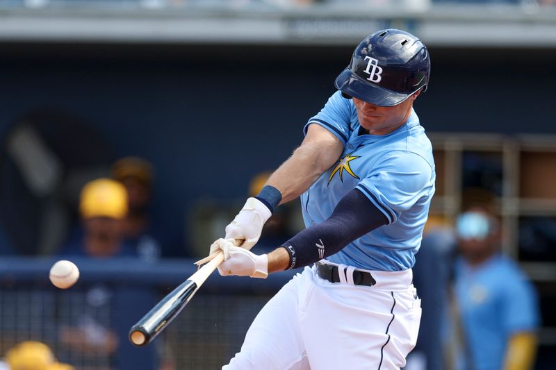 Mar 7, 2024; Port Charlotte, Florida, USA;  Tampa Bay Rays outfielder Jake Magnum (72) breaks his bat on a single against the Philadelphia Phillies in the sixth inning at Charlotte Sports Park. Mandatory Credit: Nathan Ray Seebeck-USA TODAY Sports