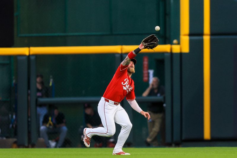 Jun 11, 2024; Cincinnati, Ohio, USA; Cincinnati Reds outfielder Jake Fraley (27) catches a fly out hit by Cleveland Guardians outfielder David Fry (not pictured) in the sixth inning at Great American Ball Park. Mandatory Credit: Katie Stratman-USA TODAY Sports