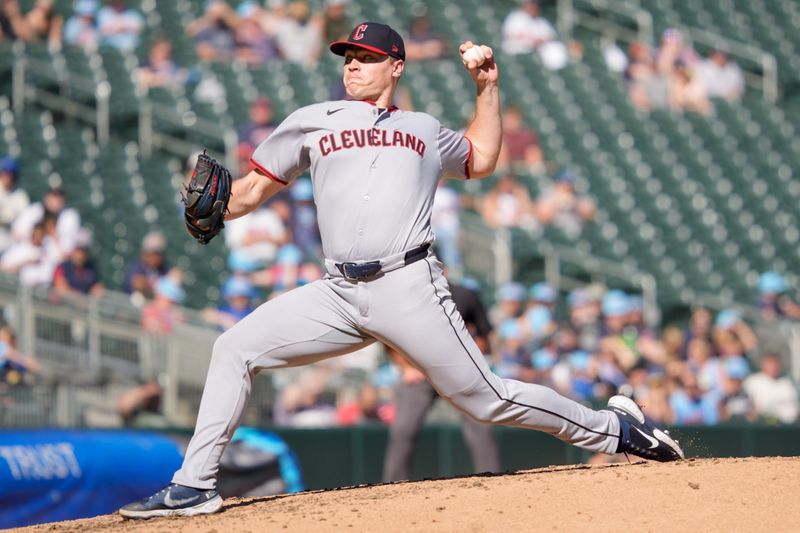 Sep 21, 2025; Minneapolis, Minnesota, USA; Cleveland Guardians pitcher Erik Sabrowski (62) pitches to Minnesota Twins second base Luke Keaschall (15) in the sixth inning at Target Field. Mandatory Credit: Matt Blewett-Imagn Images