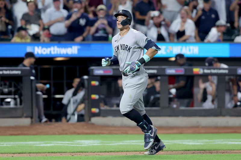 Jun 25, 2024; New York City, New York, USA; New York Yankees center fielder Aaron Judge (99) rounds the bases after hitting a grand slam home run during the eighth inning against the New York Mets at Citi Field. Mandatory Credit: Brad Penner-USA TODAY Sports