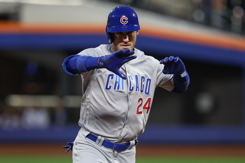 Aug 8, 2023; New York City, New York, USA; Chicago Cubs center fielder Cody Bellinger (24) celebrates his solo home run during the fourth inning against the New York Mets at Citi Field. Mandatory Credit: Vincent Carchietta-USA TODAY Sports