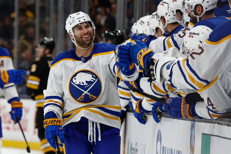Oct 11, 2025; Boston, Massachusetts, USA; Buffalo Sabres left wing Jason Zucker (17) smiles as he is congratulated at the bench after scoring against the Boston Bruins during the third period at TD Garden. Mandatory Credit: Winslow Townson-Imagn Images